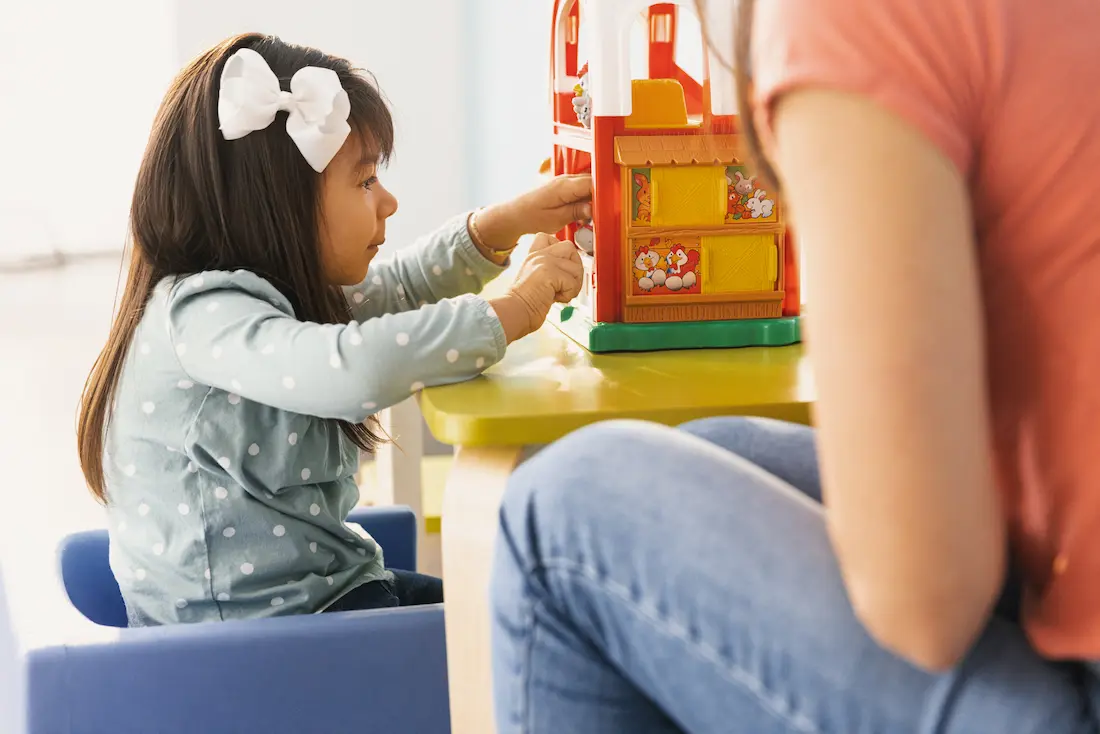 girl-playing-with-toys