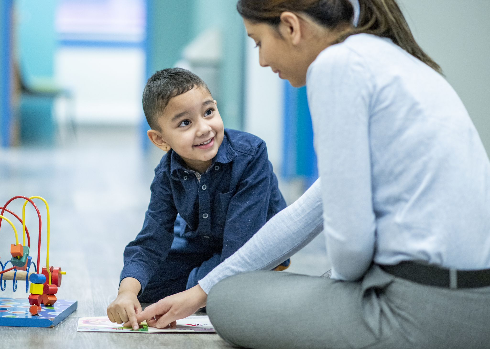 Play Therapist and a Young Patient Working Together stock photo