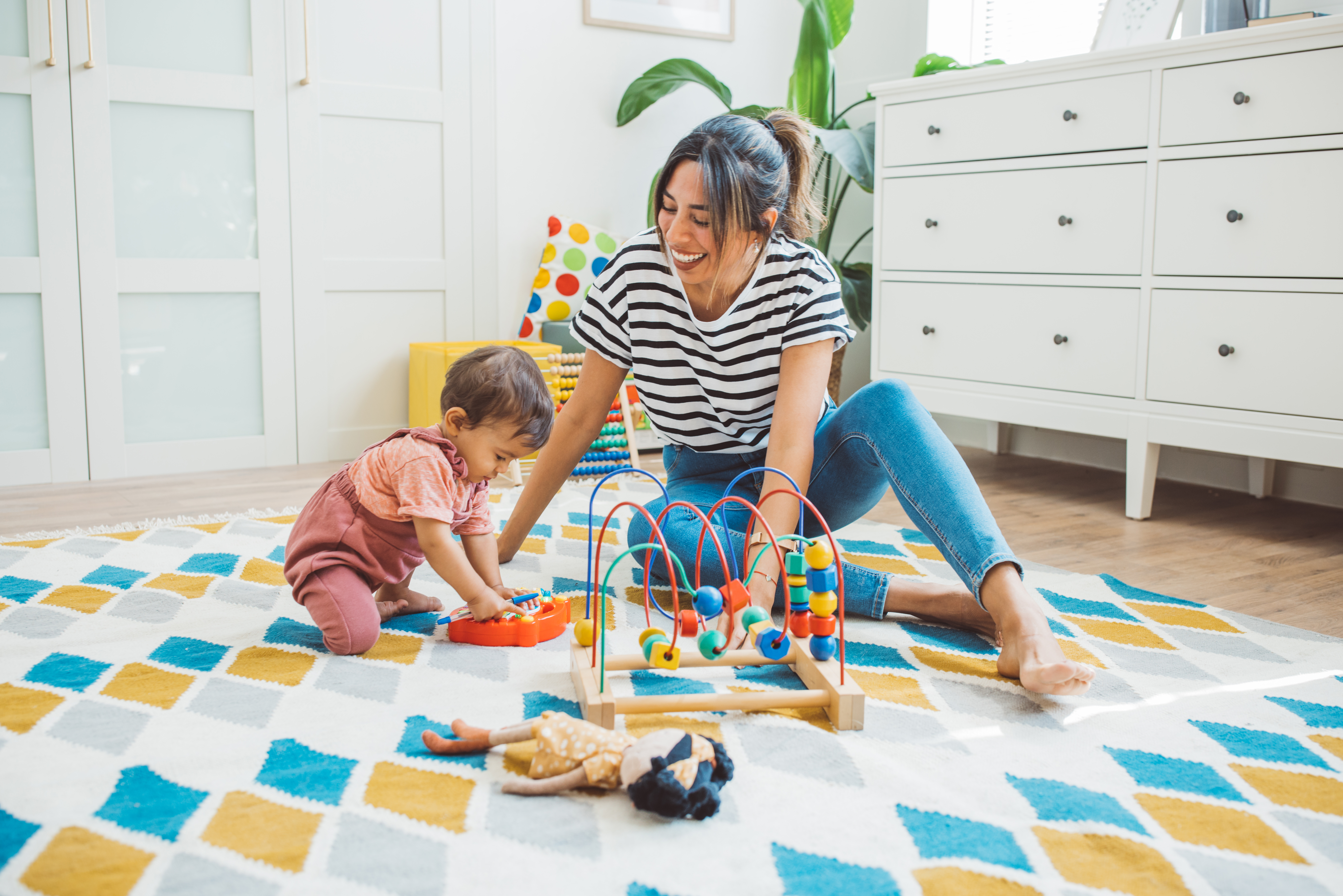 Young mother with baby at home
